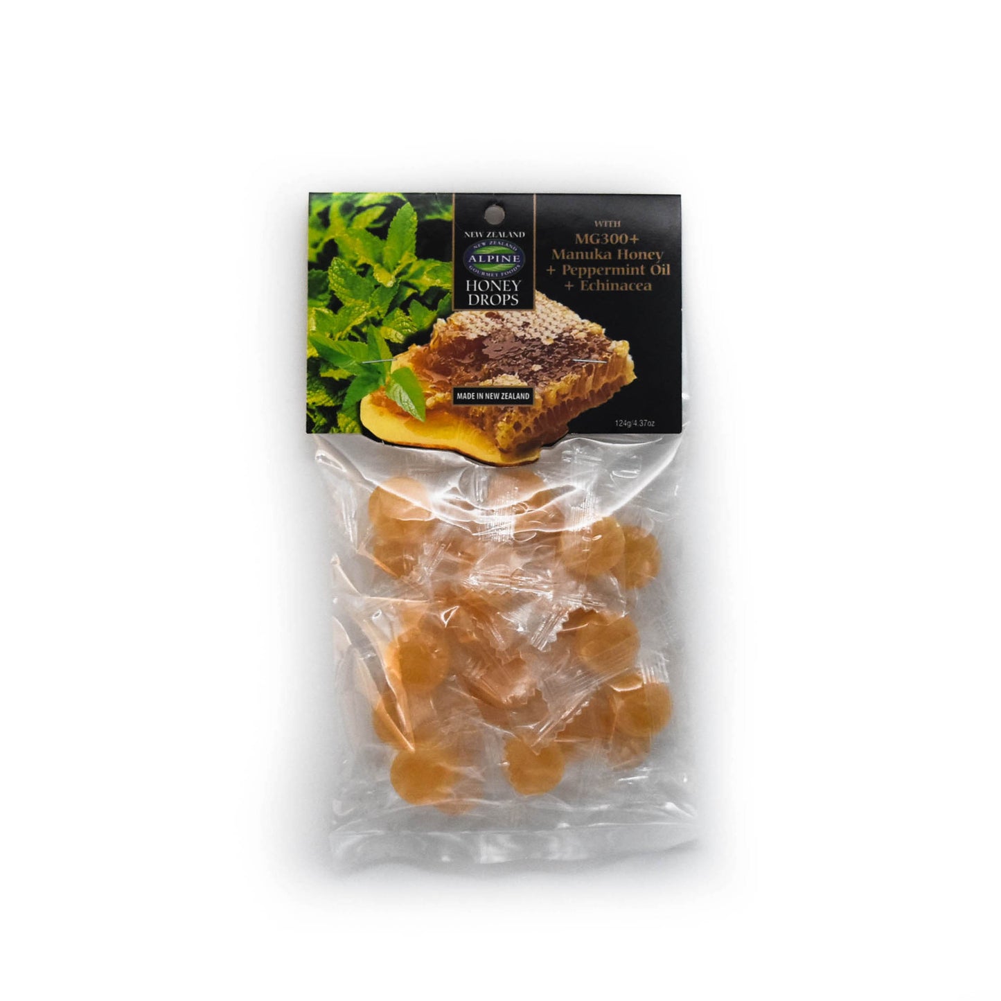A clear bag containing individually wrapped Manuka Honey Drops with Peppermint oil and Echinacea. The label indicates that the product is made in New Zealand and has an image of Peppermint leaves and honeycomb