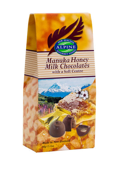 Pack of Alpine Manuka Honey Milk Chocolates with a scenic New Zealand design on the packaging.