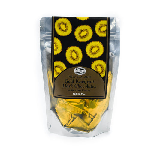 Packaging of premium dark chocolates with gold kiwifruit centre, showing the chocolates through a transparent window.