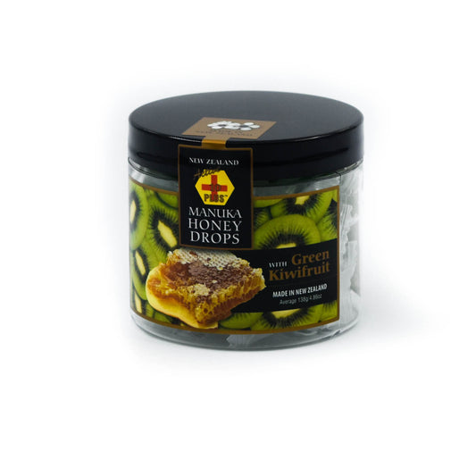 A clear jar with black lid containing individually wrapped Active 10+ Manuka Honey Drops with Green Kiwifruit and Echinacea. The label indicates that the product is made in New Zealand and has an image of Green Kiwifruit Slices and honeycomb