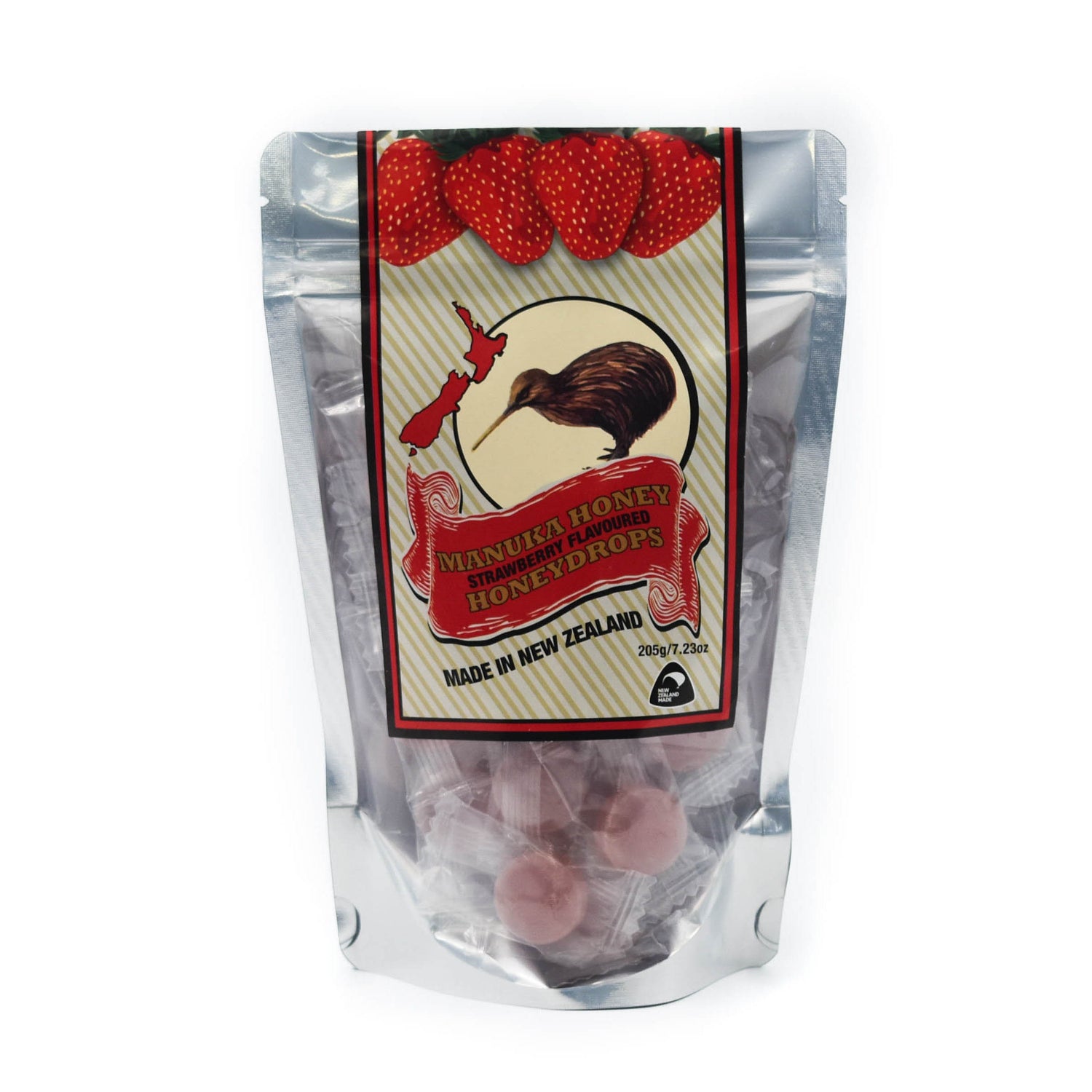 A pouch of Mānka Honey Drops in Strawberry flavor, with the product visibly contained within the clear packaging. The label shows the Mānka Honey brand logo, a kiwi bird, and strawberries, indicating the flavor.
